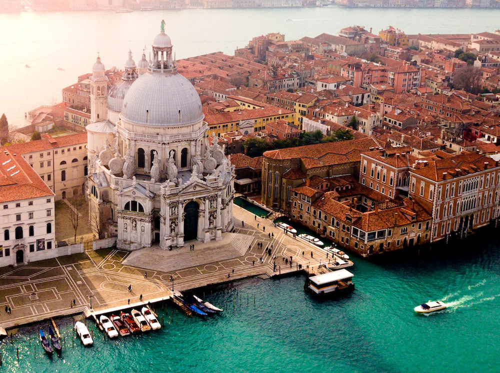 Rent a Ferrari in Venice to visit the Veneto region and experience the Venice carnival